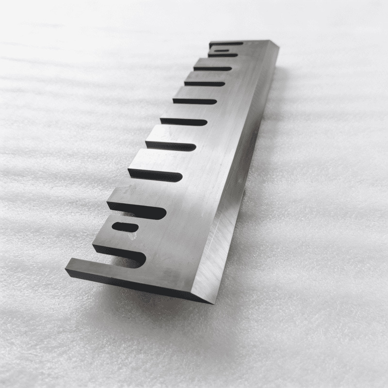 Alloy steel wood chipper blade with mounting slots